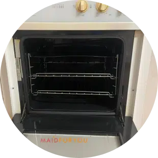 old white oven close up after being cleaned